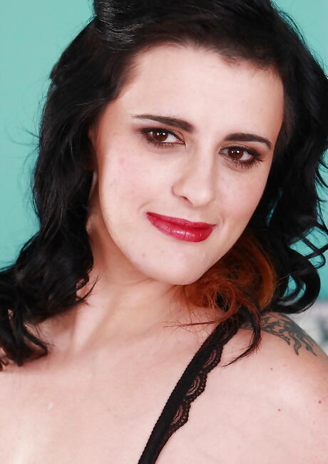 Excellent milf Elle Black in hot lingerie exposing big knockers and jerking off 